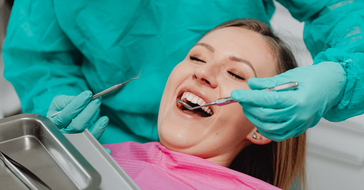 Dental procedure with patient in clinic.
