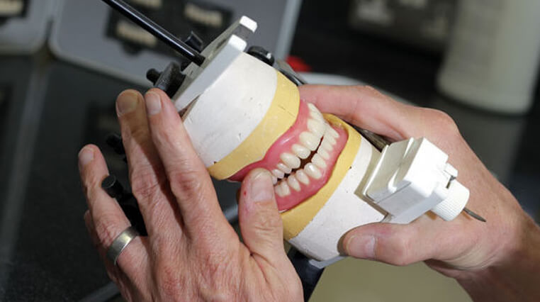 Dentures being configured